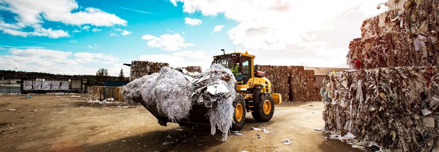 Wheel loader at waste and recycling facility